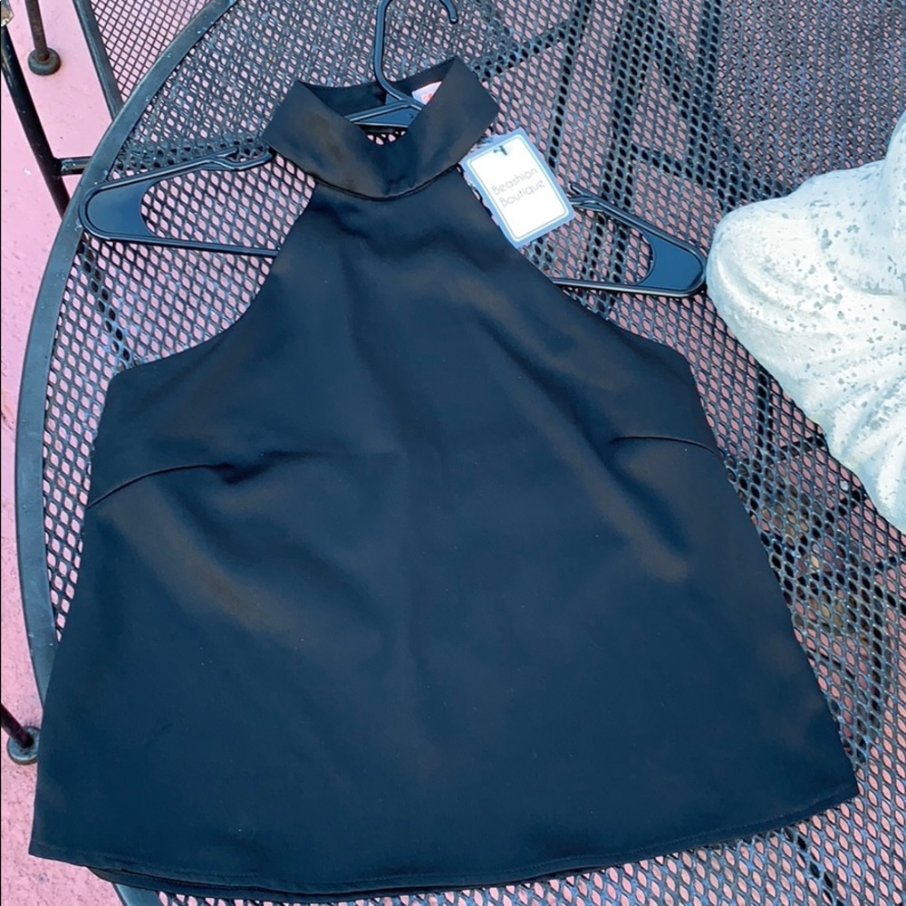 Brand new, with tags — black blouse, open back